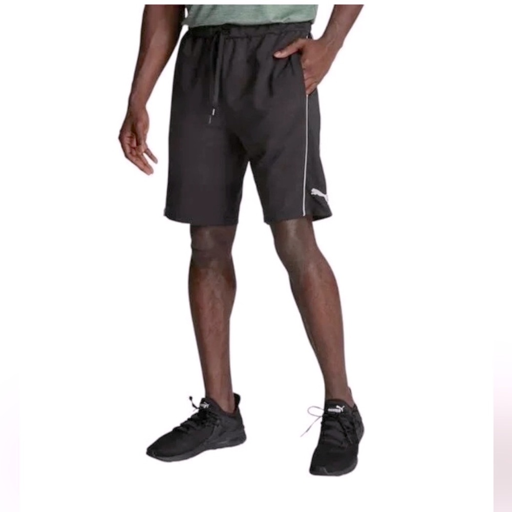 NWOT Men’s black Puma stretchlite knit shorts with white piping.  Size medium